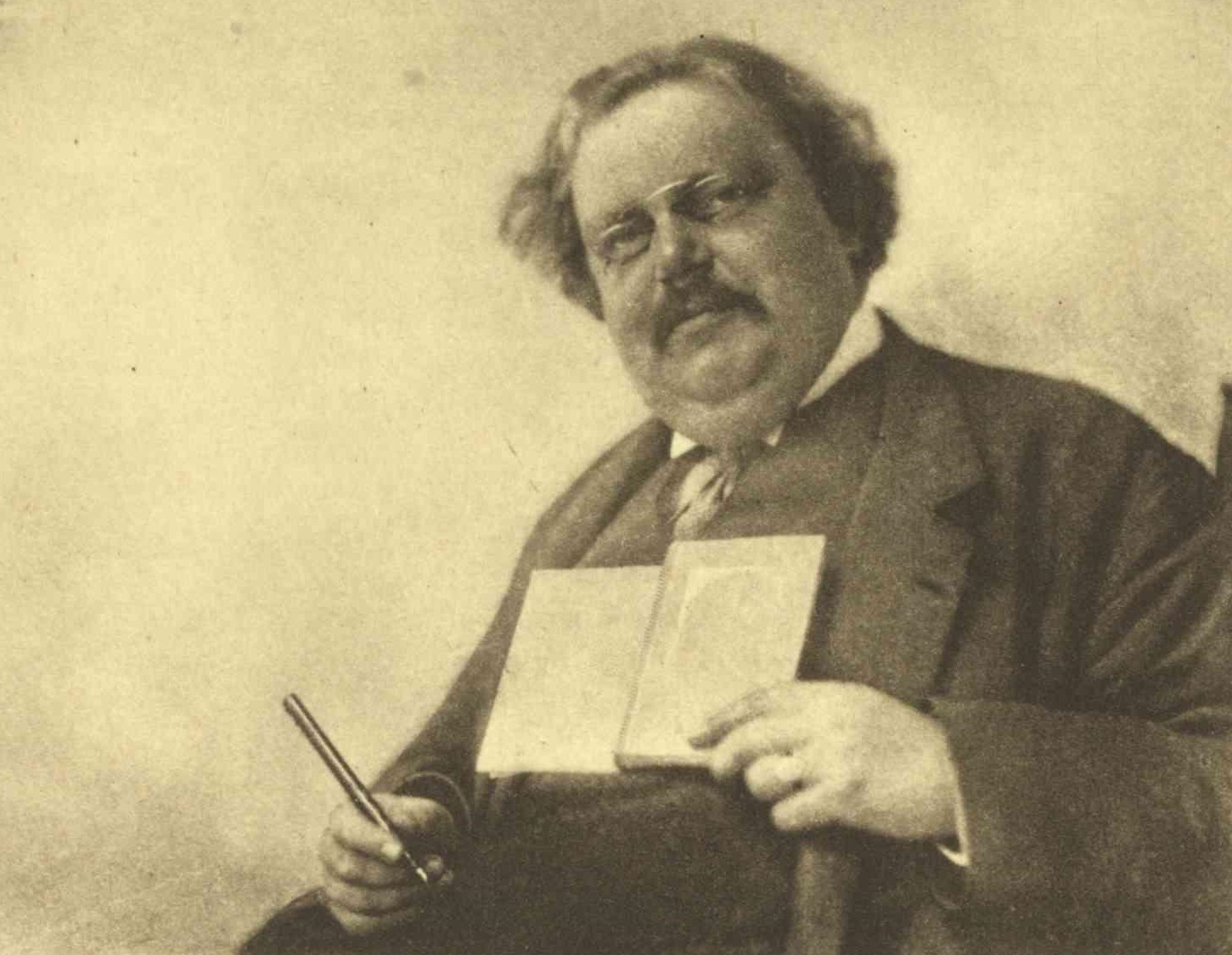 Chesterton_Holding_Book_and_Pen